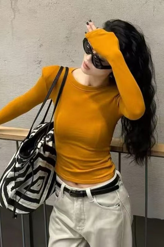 Short and petite long sleeved T-shirt for women in early autumn 2025, slim fit and slimming temperament, casual versatile round neck base shirt Short and petite long sleeved T-shirt for women in early autumn 2025, slim fit and slimming temperament, casual versatile round neck base shirt