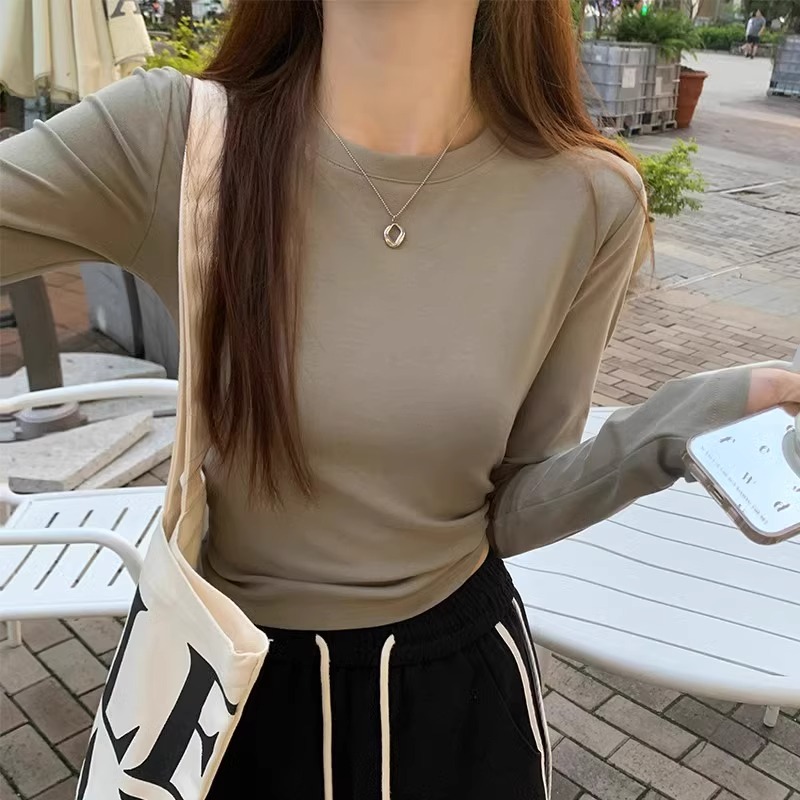 Short and petite long sleeved T-shirt for women in early autumn 2025, slim fit and slimming temperament, casual versatile round neck base shirt Short and petite long sleeved T-shirt for women in early autumn 2025, slim fit and slimming temperament, casual versatile round neck base shirt