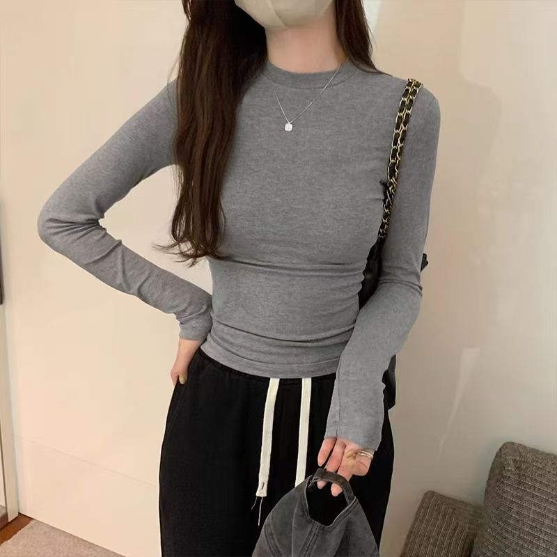 Short and petite long sleeved T-shirt for women in early autumn 2025, slim fit and slimming temperament, casual versatile round neck base shirt Short and petite long sleeved T-shirt for women in early autumn 2025, slim fit and slimming temperament, casual versatile round neck base shirt