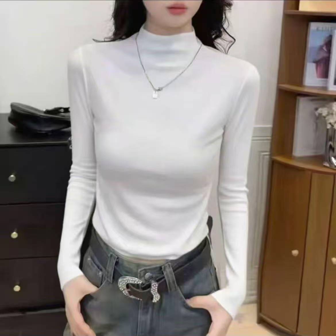 Simple and versatile half high neck base shirt for women's autumn and winter new style, small and stylish design, inner long sleeved T-shirt Simple and versatile half high neck base shirt for women's autumn and winter new style, small and stylish design, inner long sleeved T-shirt