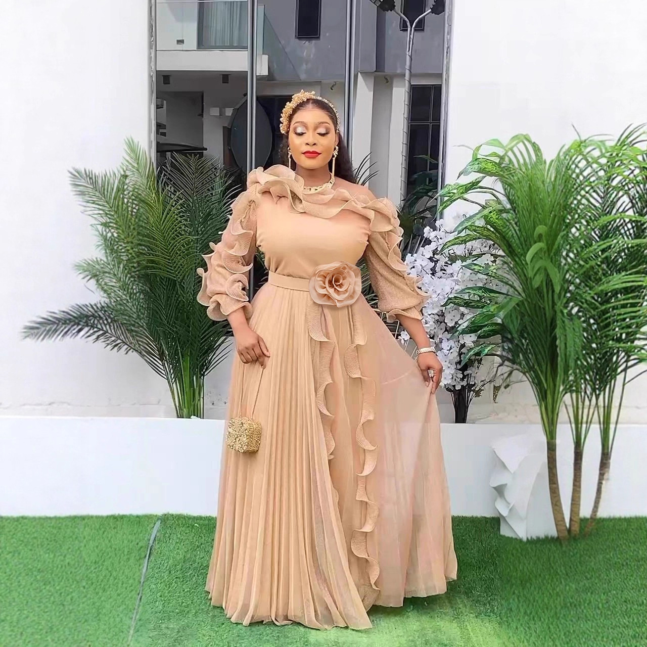 Ladies' elegant champagne chiffon evening gown in plus size with off shoulder ruffle sleeves and floral waistband, long ball dress