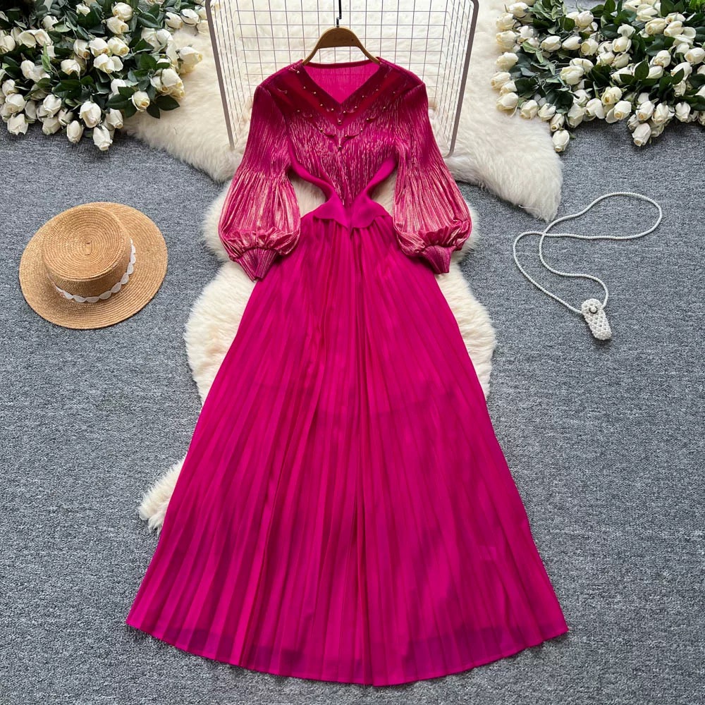 Ladies' court style bubble sleeve dress, light mature style, autumn tassel, hot stamping, pleated nail bead, large swing, women's long skirt Ladies' court style bubble sleeve dress, light mature style, autumn tassel, hot stamping, pleated nail bead, large swing, women's long skirt