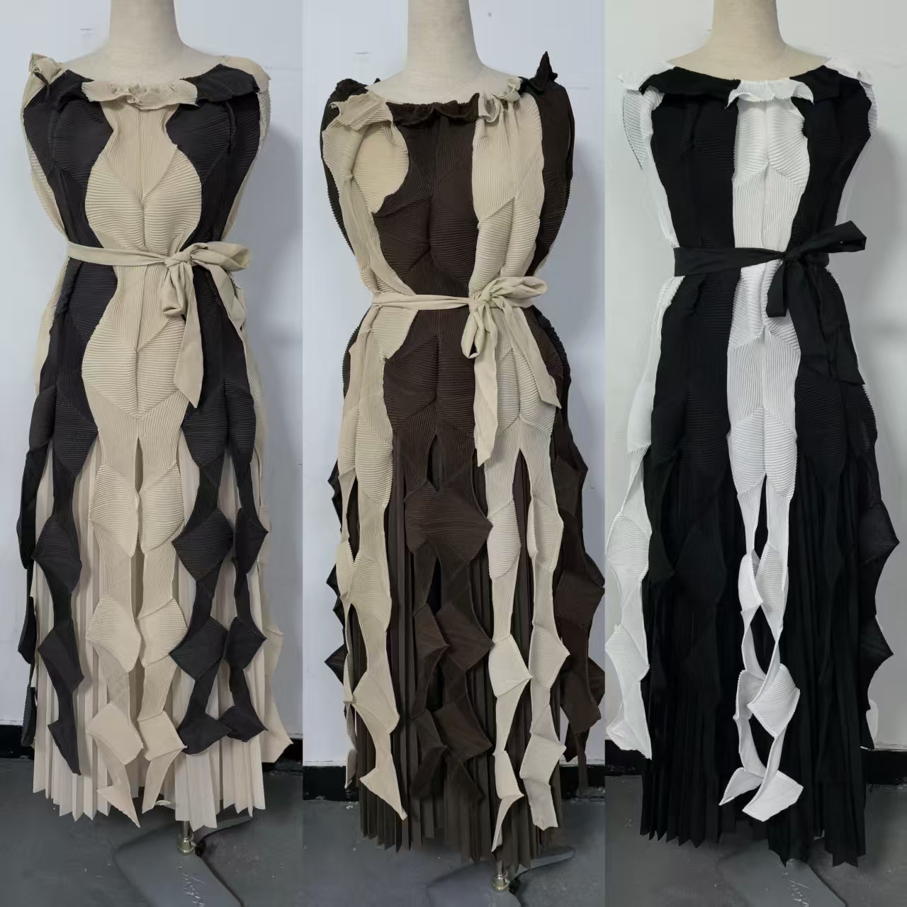 Miyake European and American foreign trade design sense, irregular folds, contrasting color straps, pleated top, high waisted pleated pants, women's suit